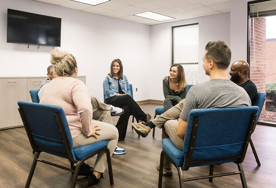 Group therapy session with patients - Partial Hospitalization Treatment Outpatient Treatment concept image