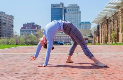 person doing yoga for addiction recovery