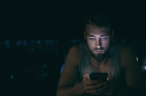 What is Digital Addiction? - man addicted to cell phone