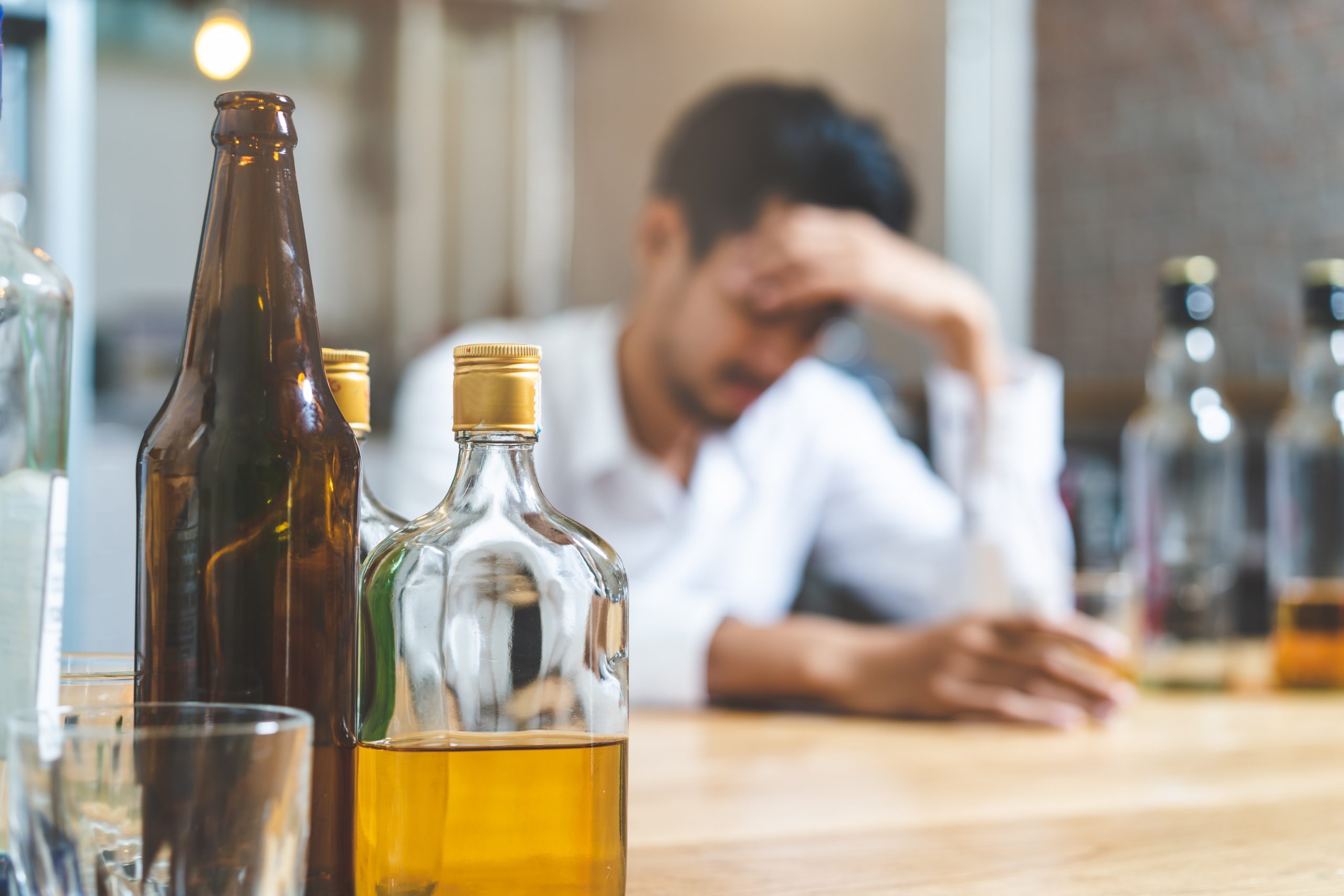 man self-medicating with alcohol for his anxiety disorder