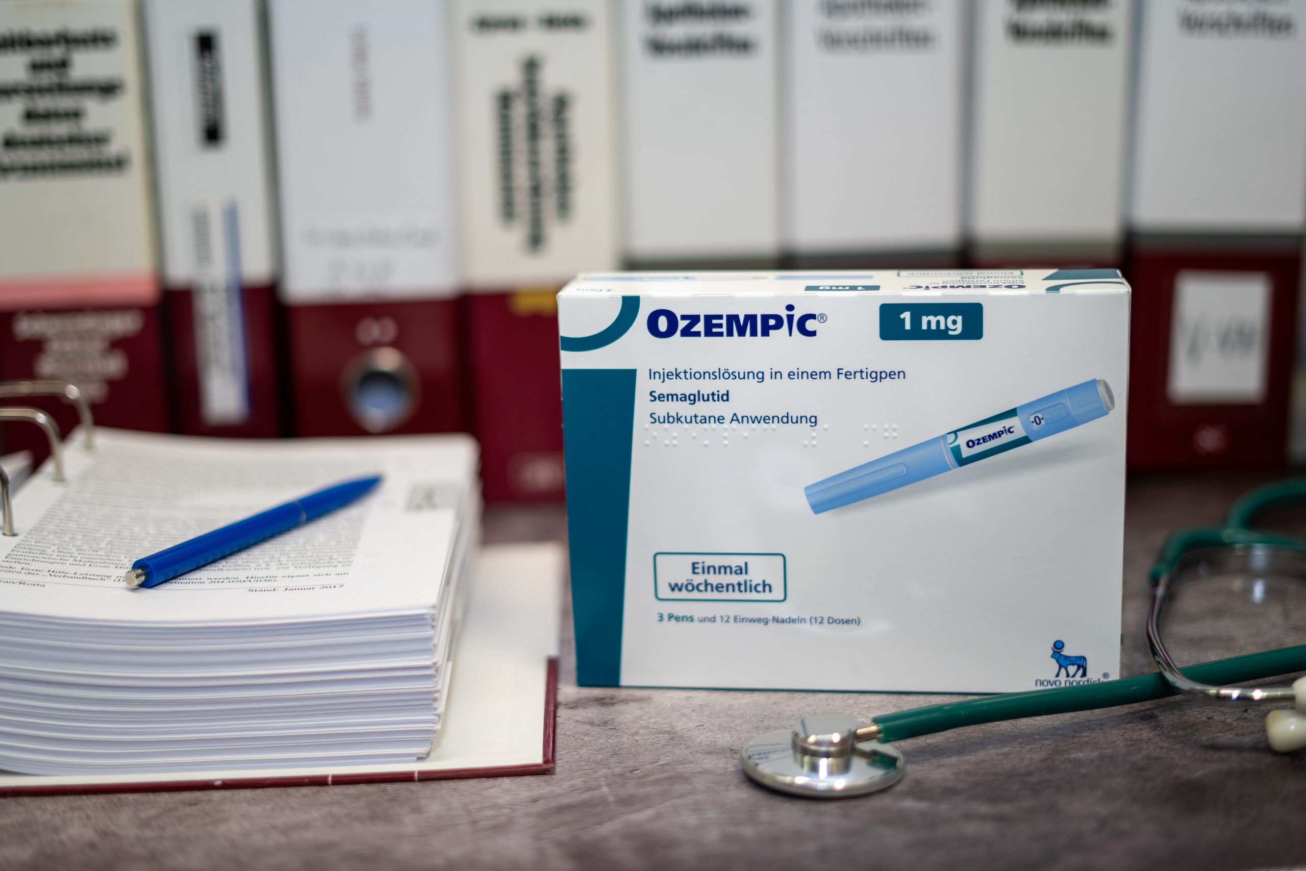 Ozempic in packaging on a table - "Can Ozempic Help Treat Addiction" concept imag