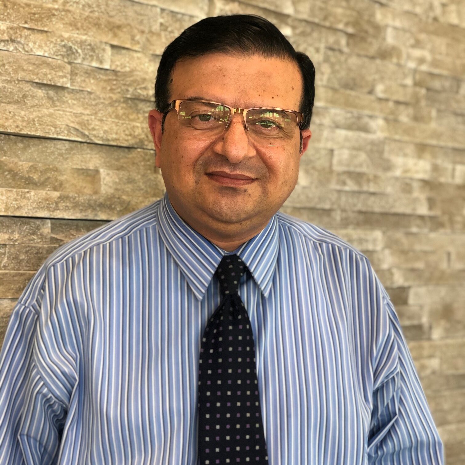 Dr. Alok Saharan, MD